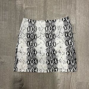 Snakeskin miniskirt! Size small. Invisible zipper on the back.